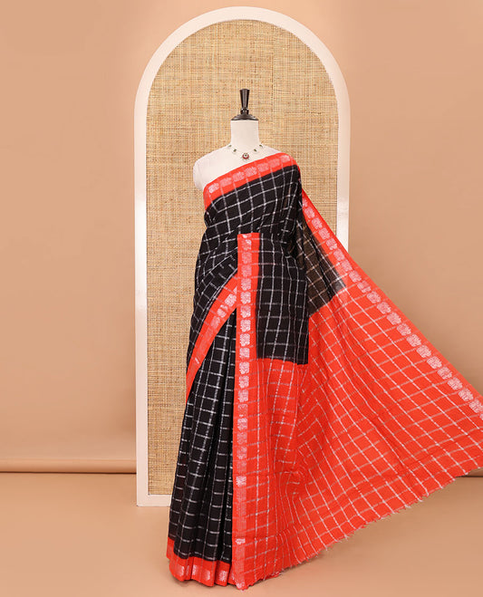 Brown zari checked sungudi cotton saree, contrast orange border of zari peacock motifs & checked peacock motif orange blouse
