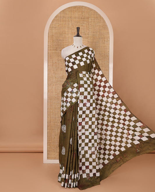 Olive green shibori dyed & batik printed mul-mul cotton saree, pasapali-checked batik printed border & pallu, & matching shibori & batik print blouse