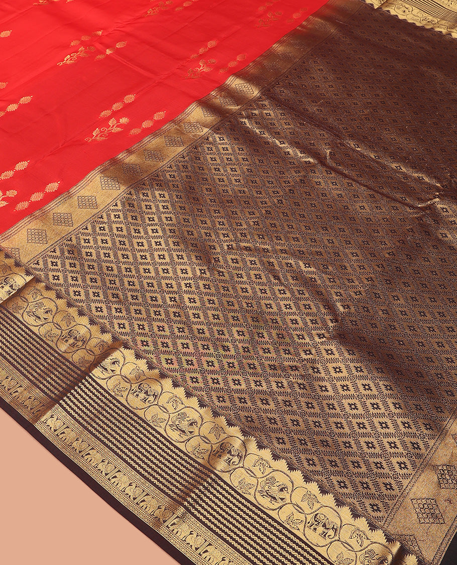 Red zari buttas Vasundhara silk mix saree, contrast border of thazampoo rekku, neli, mayil, and yaanai, and jaal pallu