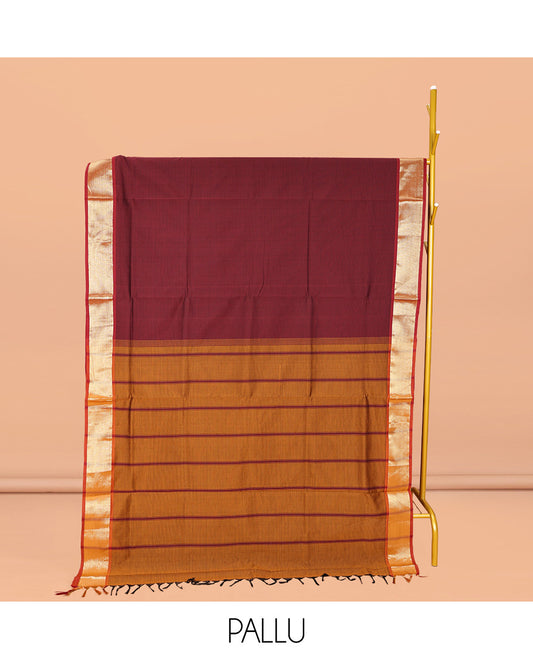 Maroon Plain Poly Cotton Saree, Complemented by a Contrast Zari Border, Contrast Striped Pallu, and Paired with a Contrast Blouse