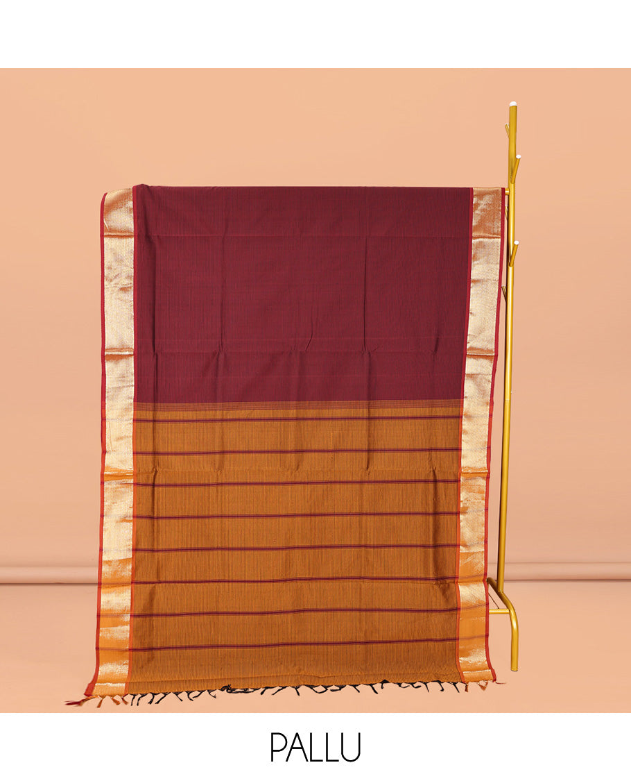 Maroon Plain Poly Cotton Saree, Complemented by a Contrast Zari Border, Contrast Striped Pallu, and Paired with a Contrast Blouse
