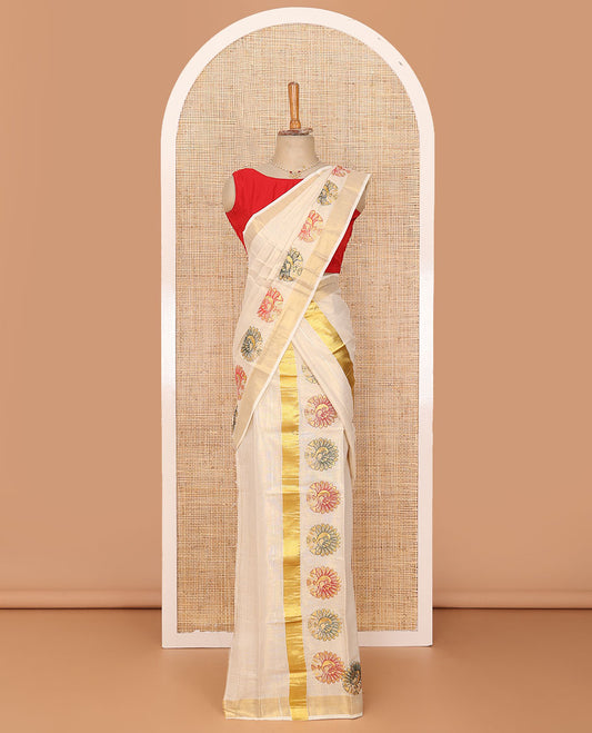 Cream plain design Kerala mundu set, peacock motifs thread embroidery and zari bavanji border