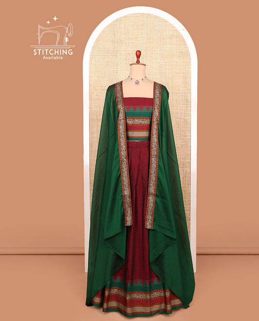 Maroon plain cotton half-saree with contrast traditional bordered skirt, matching blouse, and a contrast traditional bordered dhavani