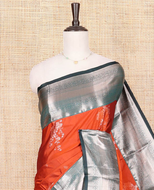 Orange Budget Silk Saree, Detailed with Zari Buttas All Over Its Body, Complemented by a Contrast Traditional Zari Design Border, Grand Chevron Striped Pallu, and Paired with a Contrast Blouse