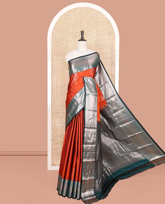 Orange Budget Silk Saree, Detailed with Zari Buttas All Over Its Body, Complemented by a Contrast Traditional Zari Design Border, Grand Chevron Striped Pallu, and Paired with a Contrast Blouse