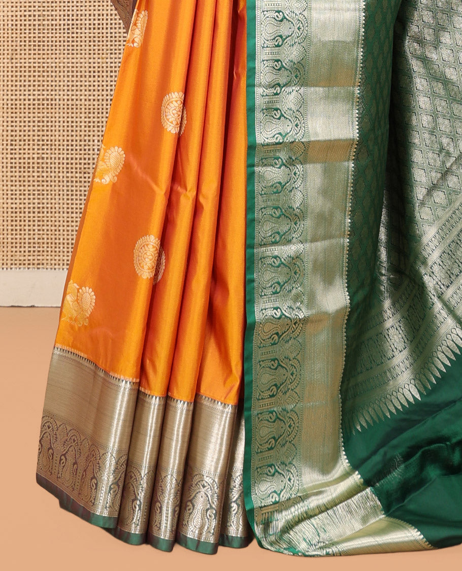 Yellow Budget Silk Saree, Artfully Detailed with Peacock-Chakram Buttas, Complemented by Contrast Traditional Zari Border, Pallu of Jaal Designs, and Contrast Blouse