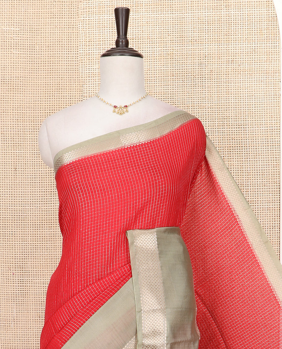 Red Assam Silk Saree Prettified with Zari Checks, Complemented by Contrast Zari Border of Triangle Motifs, a Gleaming Pallu of Zari Stripes, and Paired with a Contrast Blouse