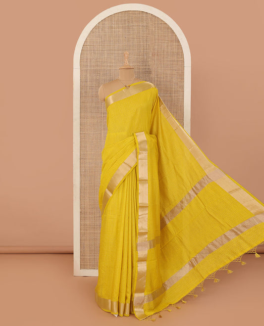Yellow checked Assam silk saree, bavanji border, and pallu of stripes