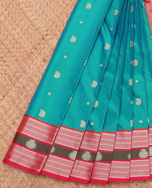 Blue Budget Silk Saree, Elegantly Framed with Zari Buttas, Complemented by a Contrast Traditional Zari Border, Grand Pallu, and a Contrast Blouse