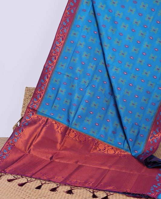 Blue ikkat geometric motifs butter silk saree with contrast floral zari border & intricate floral zari pallu