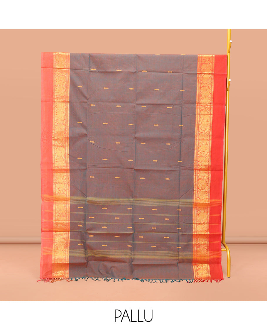 Grey Chettinad Cotton Saree, Embellished with Thread Buttas All Over Its Body, Complemented by a Contrast Kal Eragina Border of Kodi Peacock and Elephant Designs, Pallu of Buttas and Stripes, and Paired with a Matching Blouse
