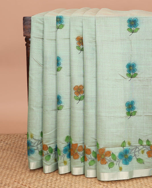Pale green floral buttas printed chirala cotton saree, bavanji border, and contrast paisley print pallu