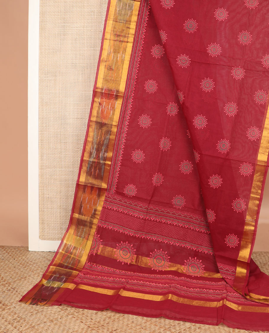 Red rangoli-style motifs printed Andhra cotton saree, ikkat border, and pallu of rangoli-style motifs