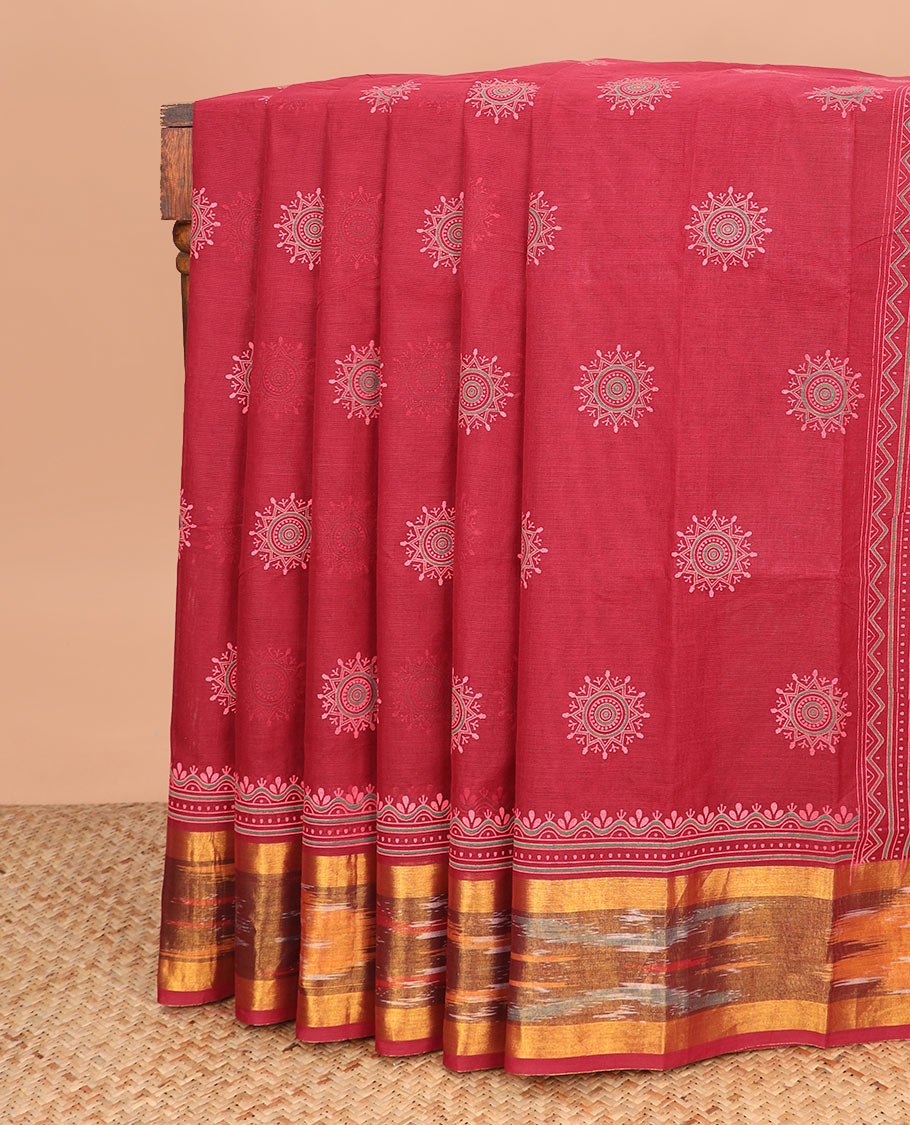 Red rangoli-style motifs printed Andhra cotton saree, ikkat border, and pallu of rangoli-style motifs