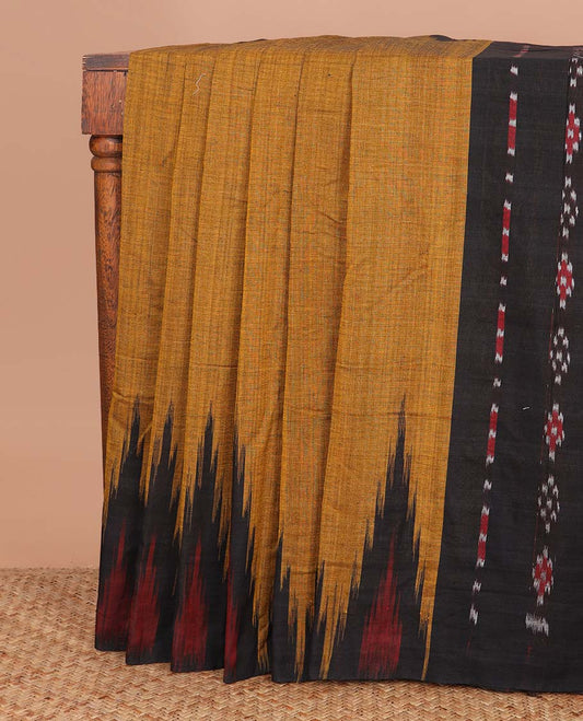 Mustard plain ikkat cotton saree, temple border, and contrast ikkat woven pallu