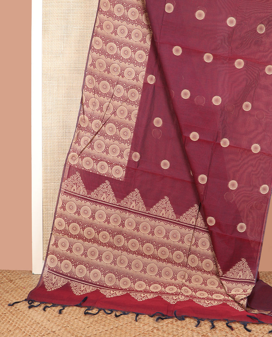 Maroon Coimbatore Cotton Saree, Beautified with Circle Buttas All Over Its Body, Subtly Made Border Steeped with Circle Designs, Pallu Mirrors the Same Body Design, and Paired with a Matching Blouse