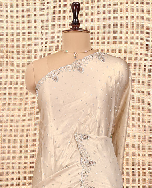 Champagne Designer Saree, Embellished with Stone Work On Its Body, Scallop Embroidered Border, and Heavy Embroidered Matching Blouse