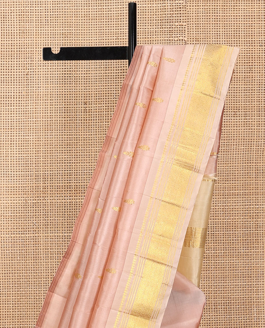 Light Sandal Kanchipuram Silk Saree, Subtly Sparkled with Buttas, a Contrast One-Sided Border of Panner Sombu, Banaras, Muthu, and Jaal Designs, a Zari Design Pallu, and No Blouse