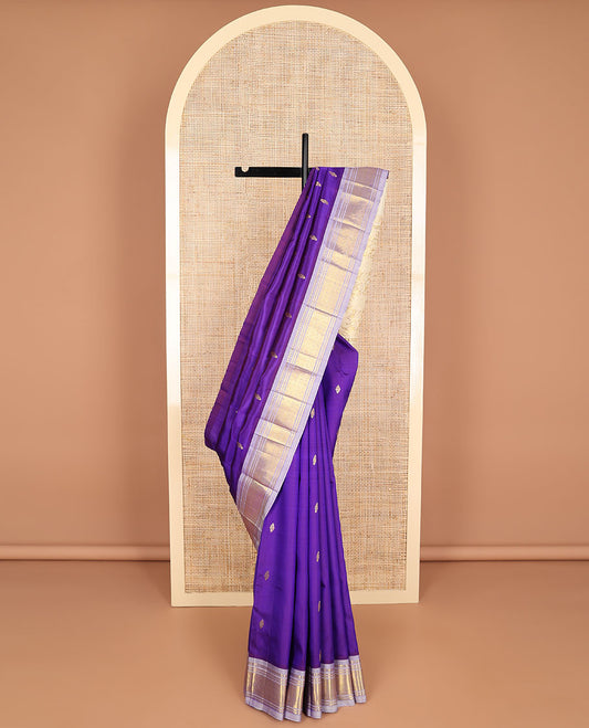 Blue buttas kancheepuram silk saree with contrast border of zari design & floral design pallu
