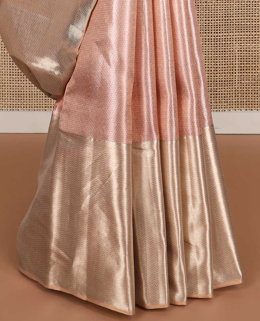 Baby pink striped kancheepuram tissue silk saree with contrast vanki design border & floral design pallu