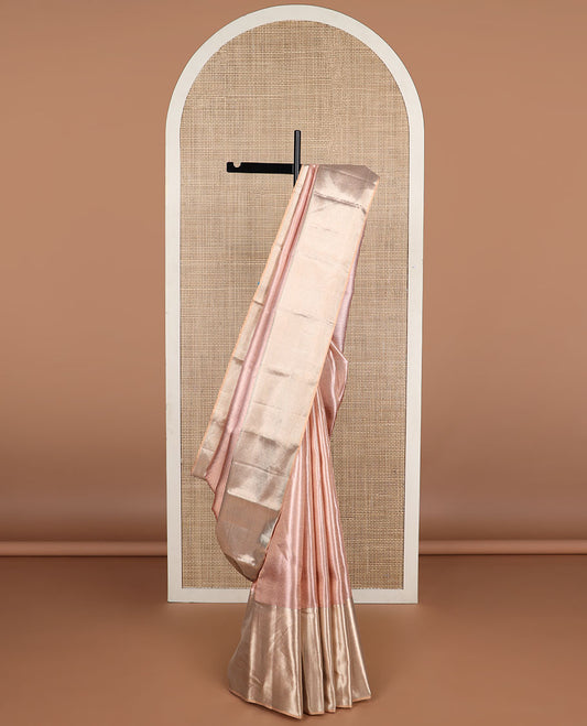 Baby pink striped kancheepuram tissue silk saree with contrast vanki design border & floral design pallu