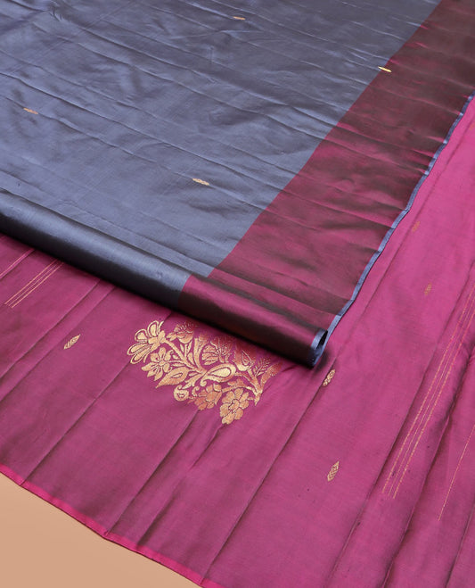 Grey Kanchipuram Silk Saree Highlighted with Zari Buttas, a Contrast Border of Floral Designs, a Subtle Woven Pallu of Floral Designs, and a Contrast Plain Blouse
