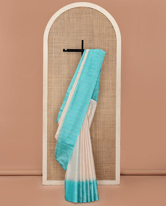 Off-White Mayuri Soft Silk Saree, Sparsely Sparkled with Buttas on Its Body, Complemented by a Contrast Border of Geometric Patterns, Pallu Steeped with Geometric Patterns, and Paired with a Contrast Blouse