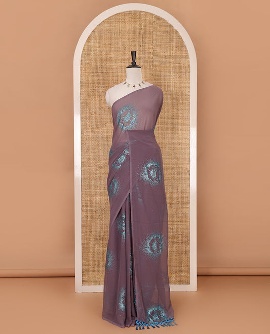 Borderless pastel lilac 60 gm georgette saree features floral vine designs, glitter embroidery work, contrast plain blouse
