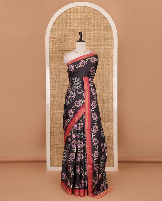 Black jamdani-style floral vine printed katan silk saree, contrast zari border, pallu mirroring the same body design & contrast printed blouse
