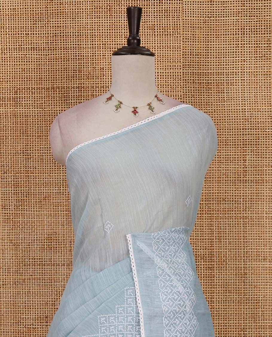 Blue diamond patterns white resham thread embroidered mercerised cotton saree, lace border, and matching plain blouse