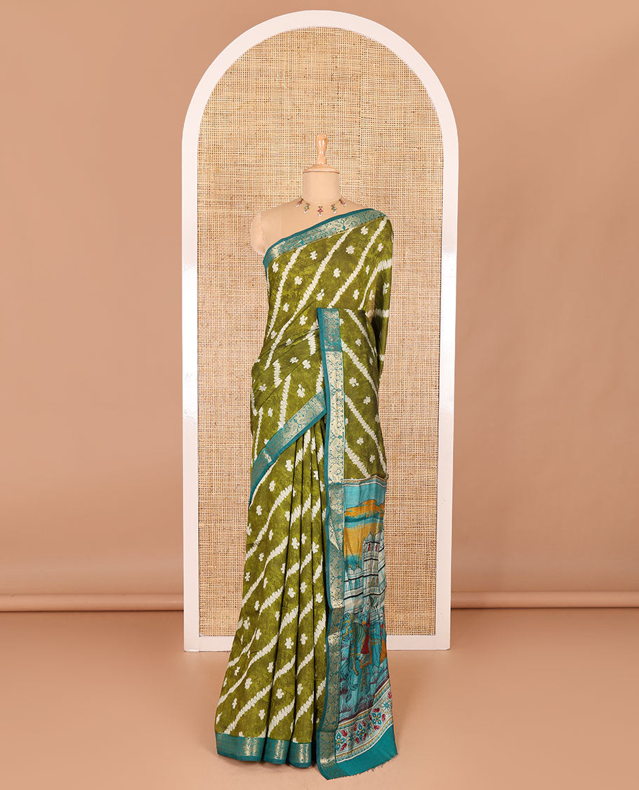 Green batik style lehariya stripes printed muslin silk saree, contrast peacock zari woven border, Mughal inspired painting style motifs printed pallu and a contrast blouse