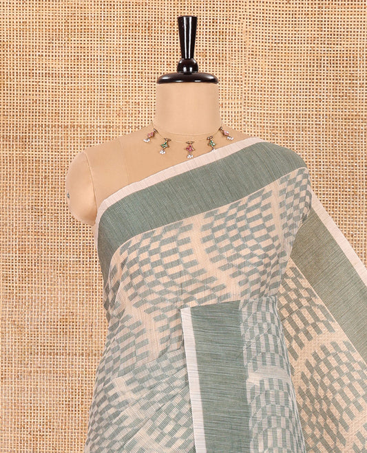 Chikku and Green Kota Cotton Saree Subtly Woven with Zig-Zag Checks in Thread, Subtly Sparkled Contrast Bavanji Border, Plain Pallu, and Paired with a Matching Blouse