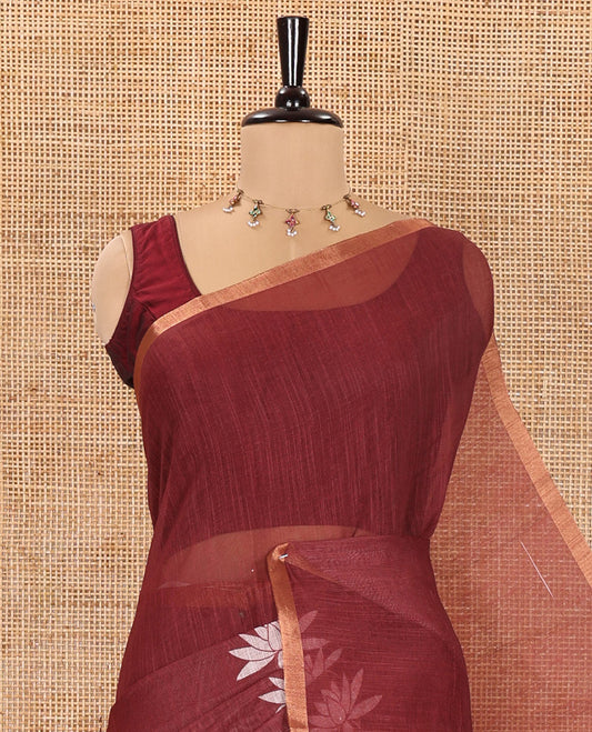 Maroon Linen Cotton Saree, Elevated with Pichwai Lotus Motifs Print, Subtle Piping Border, Pallu Mirrors the Same Pichwai Lotus Print, and Paired with a Contrast Pichwai Lotus Printed Blouse