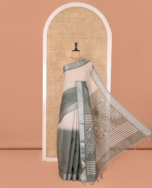 Cream and Green Plain Linen Cotton Saree, Subtly Ombre-Style Dual-Color Dye on Its Body, Subtle Bavanji Zari Border, Pallu Features Rangoli-Style Patterns Print, and Paired with a Polka Dots Printed Blouse