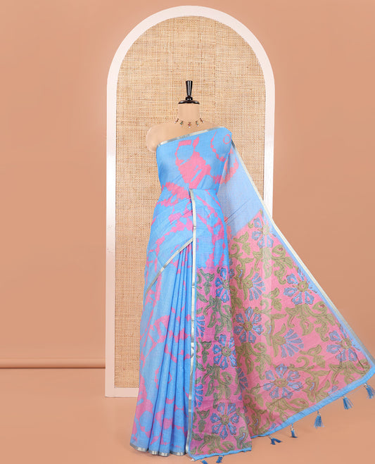 Light Blue Linen Cotton Saree, Graced with Shibori Printed on Its Body, Subtle Piping Border, Pallu Features Floral Print, and Paired with a Contrast Floral Printed Blouse