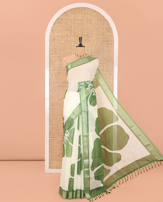 Lemon Yellow Linen Cotton Saree, Prettified with Big Floral Prints On Its Body, Complemented by Contrast Zari Bavanji Border, Floral Printed Pallu, and Paired with a Hand Block Printed Blouse