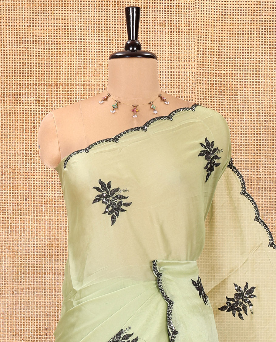 Green Rangoli Chiffon Saree, Finely Crafted with Floral Embroidery Motifs on Its Body, Scallop Embroidered Border, Embroidered Pallu, and Paired with a Contrast Blouse
