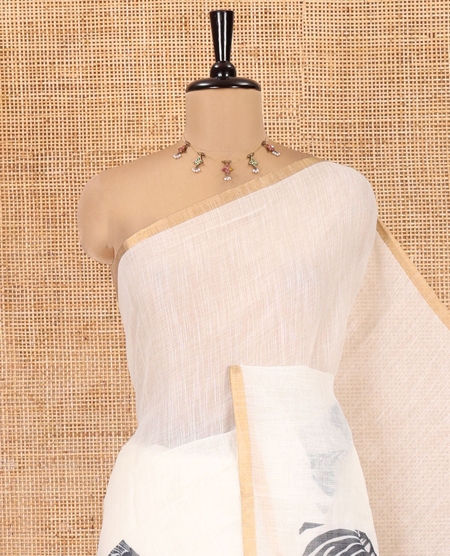 Off-white Linen Cotton Saree, Accentuated with Zebra Motifs Print, A Subtle Piping Border, Zebra Printed Pallu, and Comes with a Contrast Blouse