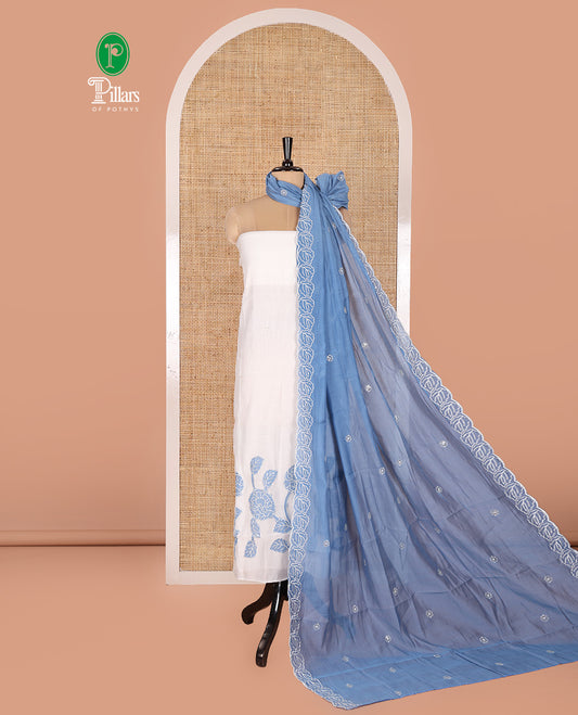 Cream and Blue Mul Chanderi Material Chudidar Set, Delicately Designed with Floral Embroidery On Its Top, A Plain Santoon Bottom, and Comes with a Contrast Scallop Floral Embroidered Dupatta