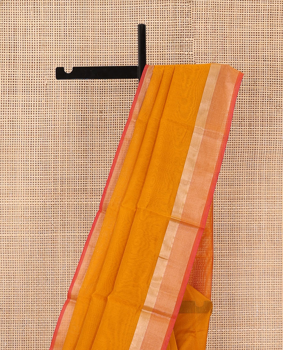 Orange plain silk cotton saree, contrast zari border, and plain pallu