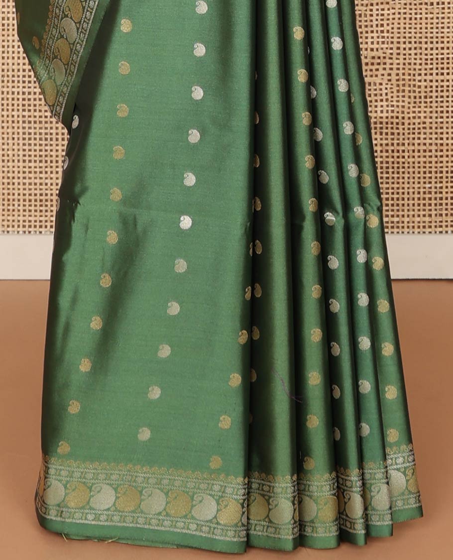Green paisely motifs soft silk saree with self zari design border & floral design pallu