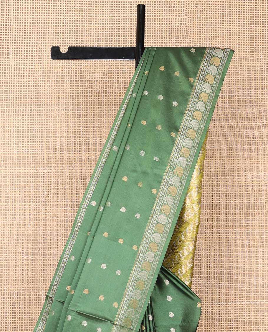 Green paisely motifs soft silk saree with self zari design border & floral design pallu