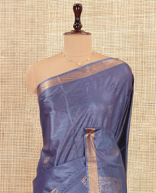 Grey Tussar Saree, Enriched with Warli Buttas, a Subtle Zari Border, Pallu of Warli Designs, and a Matching Blouse