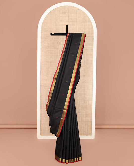 Black Uppada Silk Saree, Adorned with Buttas All Over Its Body, Complemented by a Contrast Bavanji Border, Pallu of Unique Designs, and Paired with a Matching Blouse