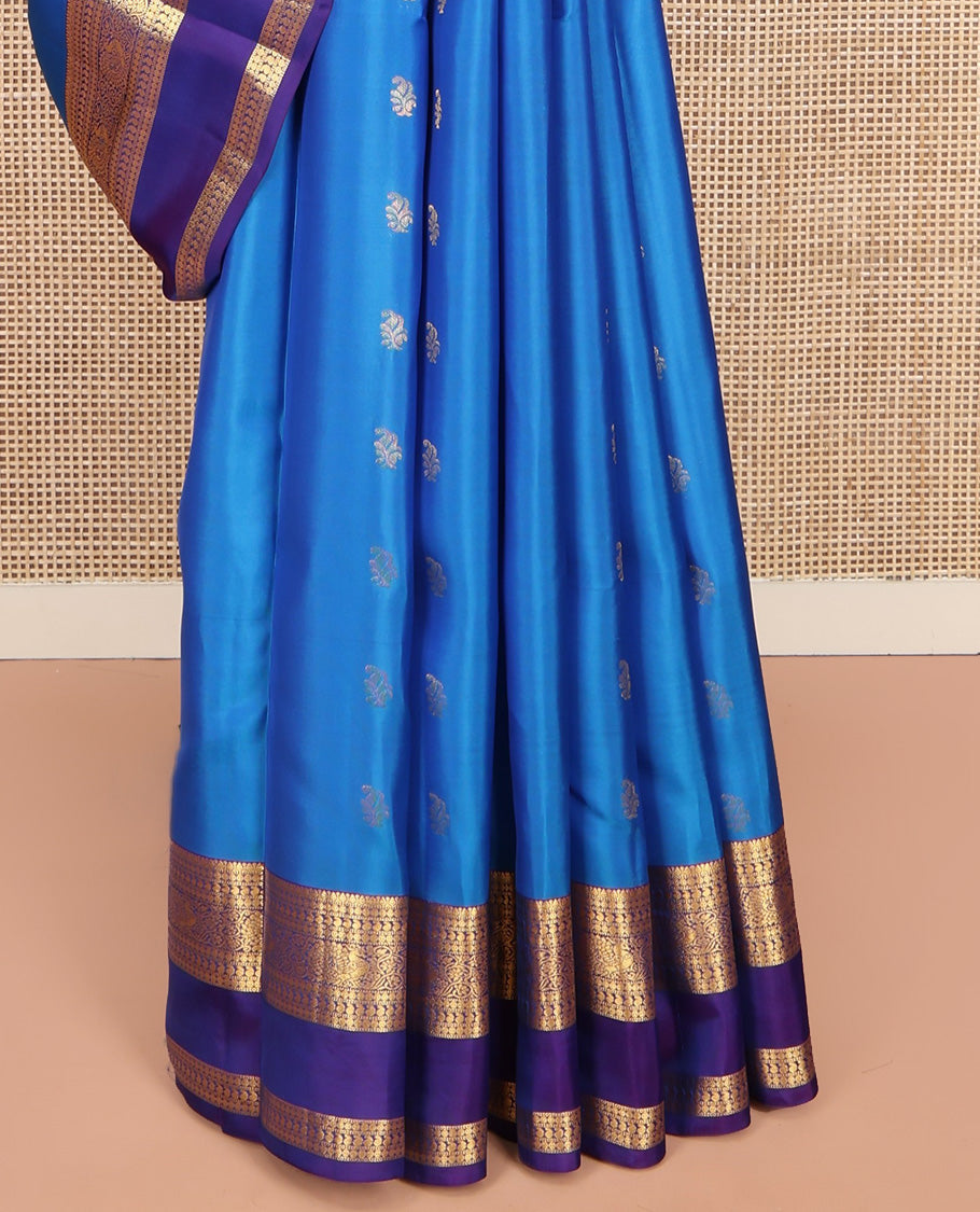 Blue Vasundhara Lite Silk Mix Saree, Detailed with Zari Buttas on Its Body, Complemented by a Contrast Border of Thilakam, Rudraksham, Manga, and Mayil Designs, Grand Pallu, and Paired with a Contrast Blouse