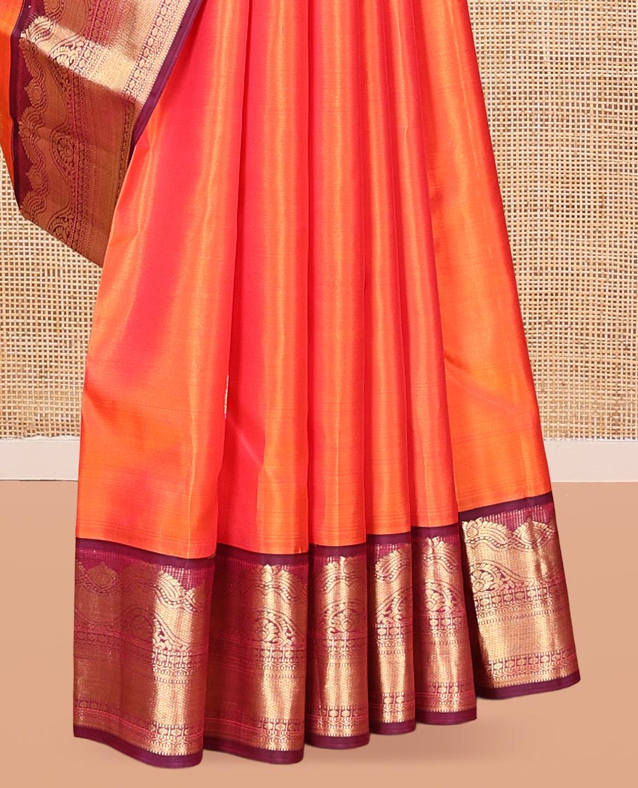 Orange Vasundhara Silk Saree Featuring Zari Buttas, Contrast Traditional Zari Border, Pallu Steeped with Paisleys, and Contrast Blouse