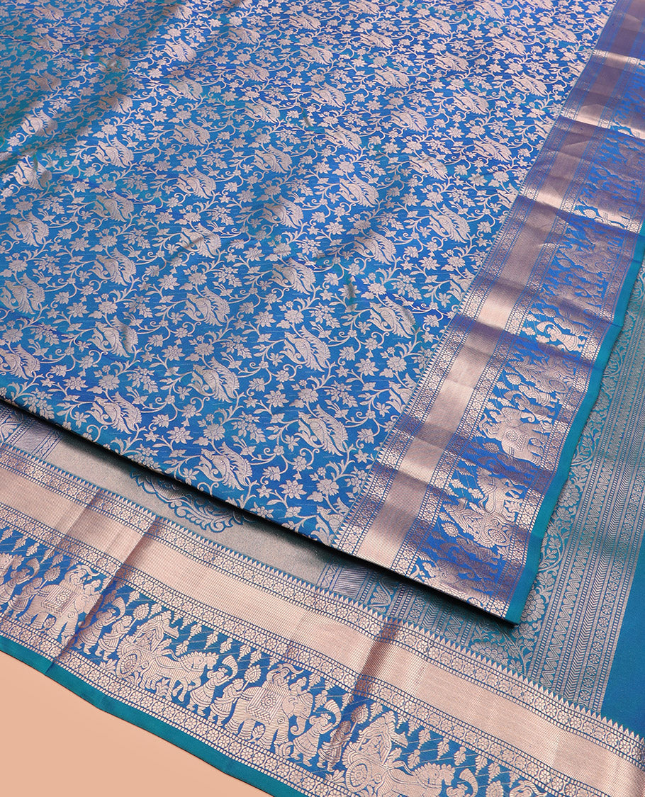 Blue Kanchipuram Silk Saree Elegantly Framed with Jacquard Design, Highlighted by Zari Border of Rekku, Muthu, Kamalam, and Prince in Palanquin Designs, Beautifully Bedecked Pallu, and Paired with a Matching Blouse