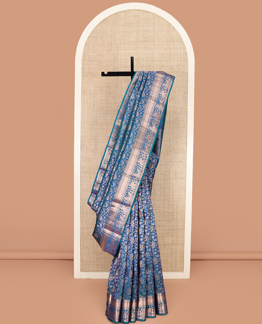 Blue Kanchipuram Silk Saree Elegantly Framed with Jacquard Design, Highlighted by Zari Border of Rekku, Muthu, Kamalam, and Prince in Palanquin Designs, Beautifully Bedecked Pallu, and Paired with a Matching Blouse