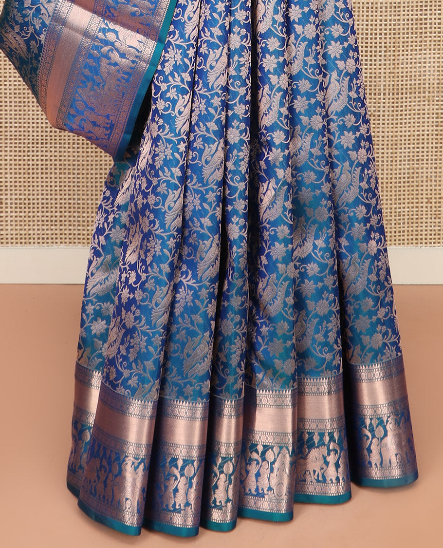 Blue Kanchipuram Silk Saree Elegantly Framed with Jacquard Design, Highlighted by Zari Border of Rekku, Muthu, Kamalam, and Prince in Palanquin Designs, Beautifully Bedecked Pallu, and Paired with a Matching Blouse