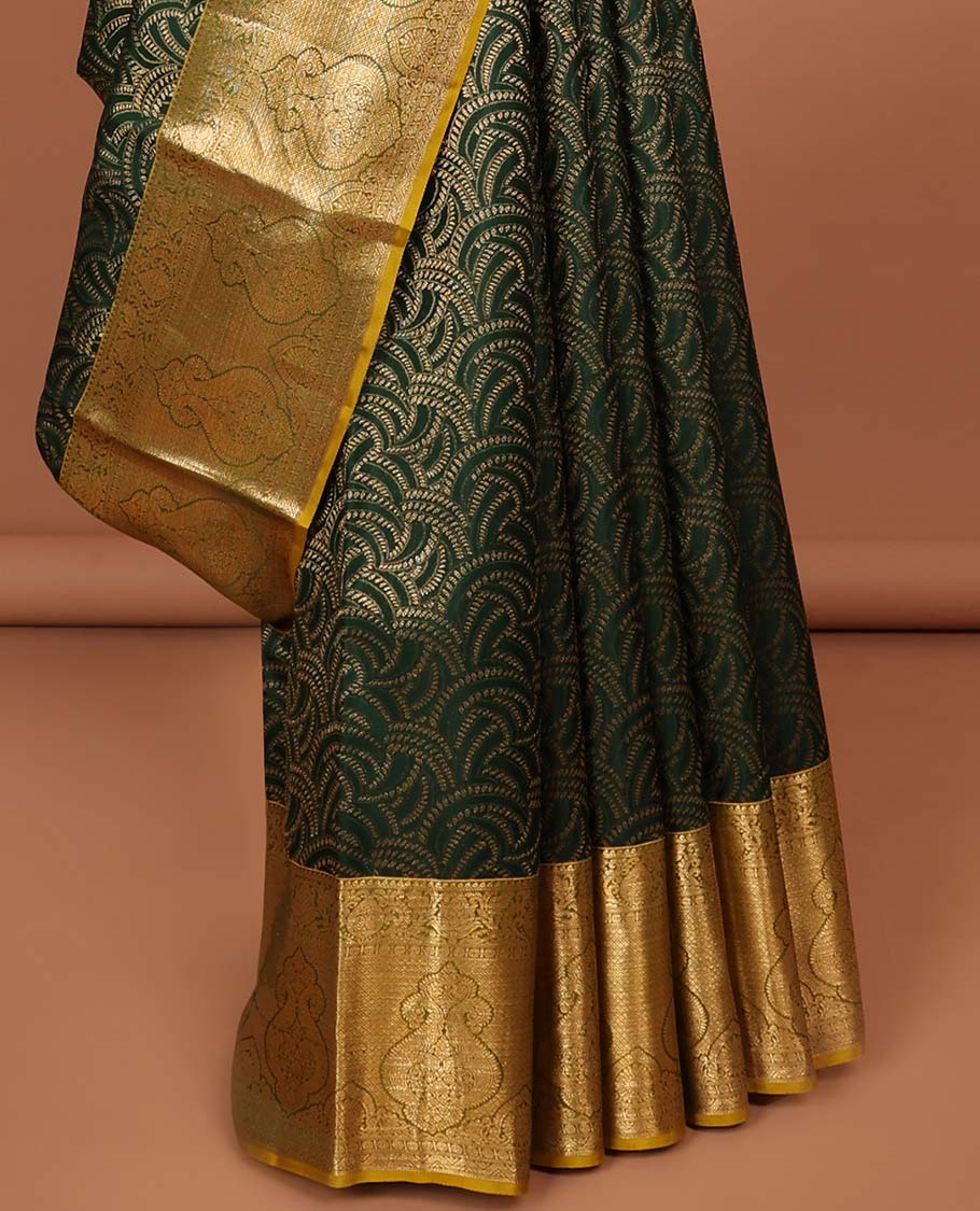Green geometric design kancheepuram silk saree with contrast floral zari border & pallu of paisley design